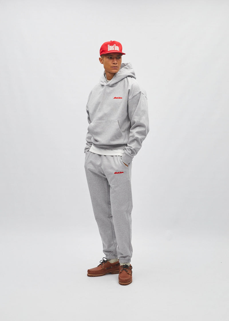 Kapuzenpullover mit Kalligrafie-Logo